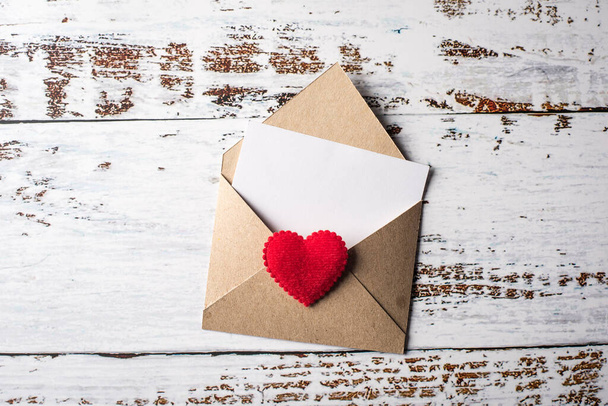 Blank Letter on wood background, valentine's day concept - Foto, Bild