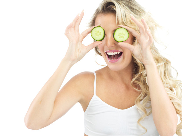 Woman with cucumber - Foto, Imagen