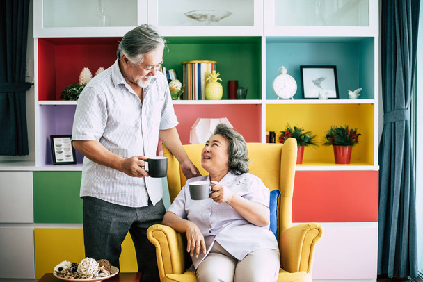 Elderly Couple Talking together and drinking coffee or milk - Photo, Image
