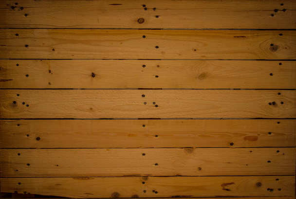 Front view of wooden pallet. Closeup of of boards knit together. - Φωτογραφία, εικόνα