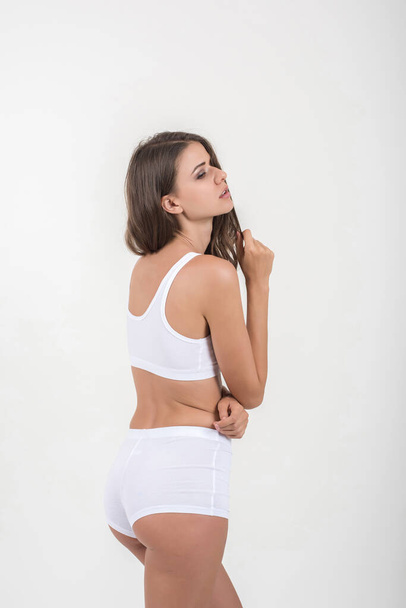 Beautiful woman with healthy body on white background - Zdjęcie, obraz