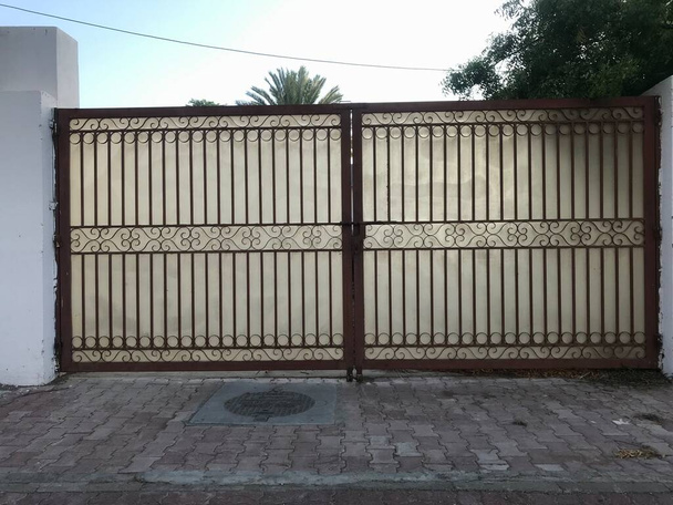Steel Gates with two leafs make of Galvanized steel with poly material back cover for better protection for a palace or residential villa - Photo, Image