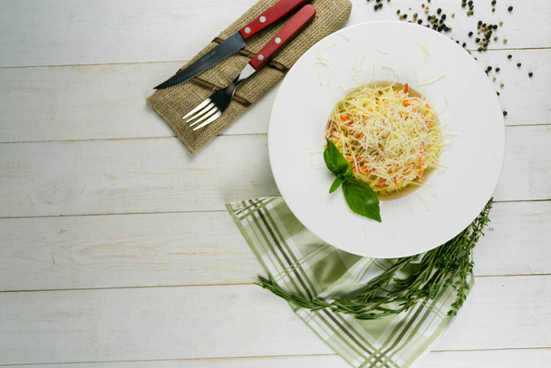 pasta with salmon on a linen towel on a wooden background - Foto, Imagen