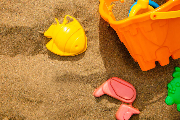 Children's beach toys on sand - Foto, Imagen