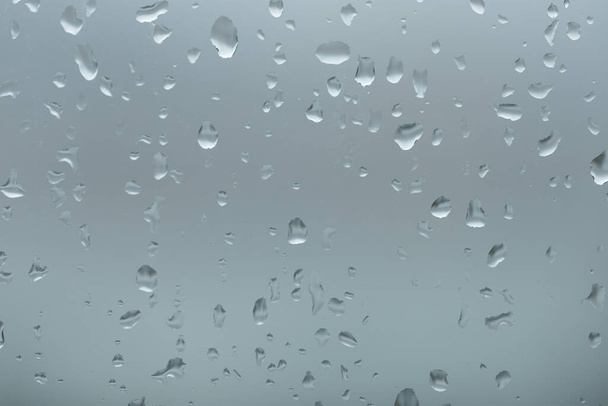 Сильний дощ на вікні
 - Фото, зображення