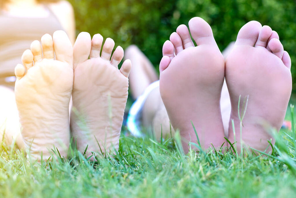feet in grass, cocept of rest - Photo, Image