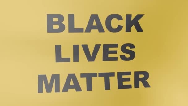 Drapeau jaune avec l'inscription : Black Lives Matter. Le drapeau se développe dans le vent. Manifestations contre le concept de racisme. Animation 3D. - Séquence, vidéo