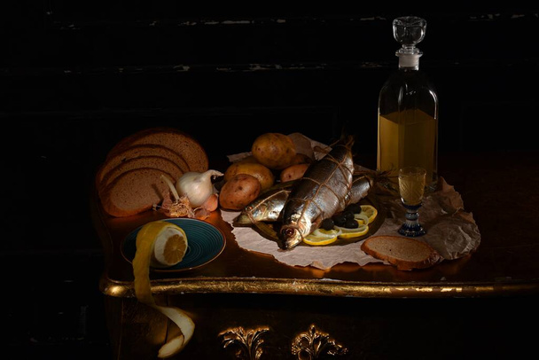 Dutch still life with herring, moonshine and vegetables. - Photo, Image