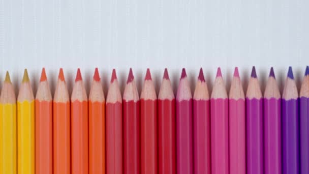 Gros plan de crayons de couleur fond, Slider shot - Séquence, vidéo