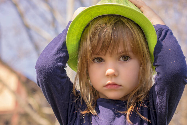 portrait of a girl with a green hat - Photo, Image