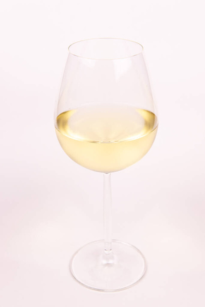 Glass of white wine on white background isolated. - Фото, зображення
