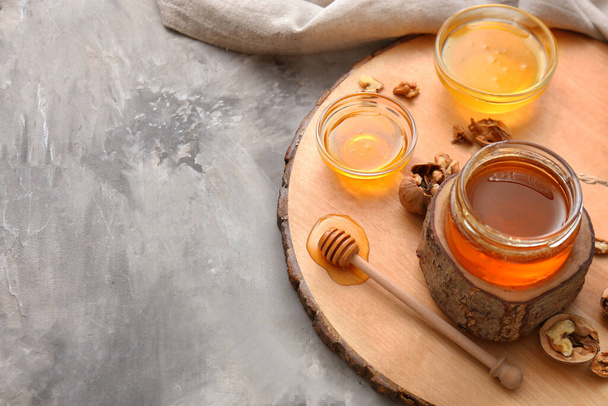 Composition with sweet honey on table - Fotoğraf, Görsel
