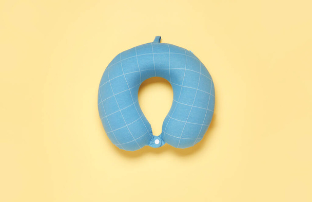 Travel pillow on color background - Фото, зображення