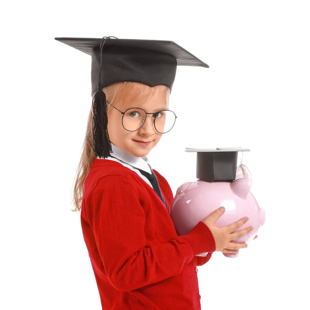 Mała dziewczynka z oszczędności na edukację na białym tle - Zdjęcie, obraz