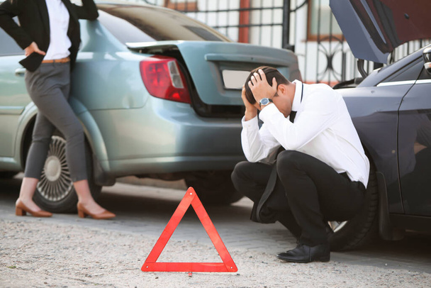 Stressed drivers near broken cars after accident - Fotoğraf, Görsel
