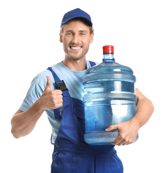Dodávka muž s lahví vody ukazující palec nahoru gesto na bílém pozadí - Fotografie, Obrázek