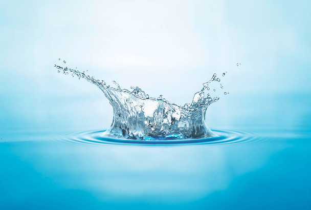 Blue water, water drop splash isolated on white background - Foto, afbeelding