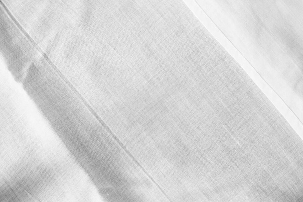 Weißer Hintergrund aus zerknittertem Gewebe - Foto, Bild