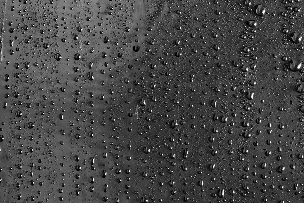 Vízcseppek sötét üveg textúra háttér - Fotó, kép