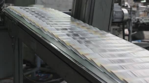 close-up footage of Industrial printing of leaflets and magazines - Footage, Video