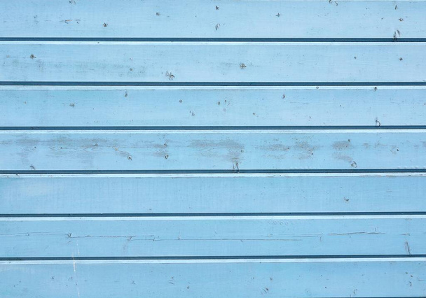 A closeup shot of a blue wood texture -perfect for background or wallpaper - Photo, image