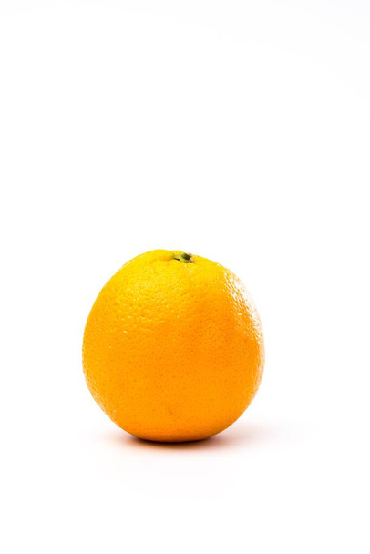 A whole yellow-orange isolated on a white background - Foto, imagen
