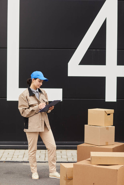 Woman taking the parcels - Photo, Image