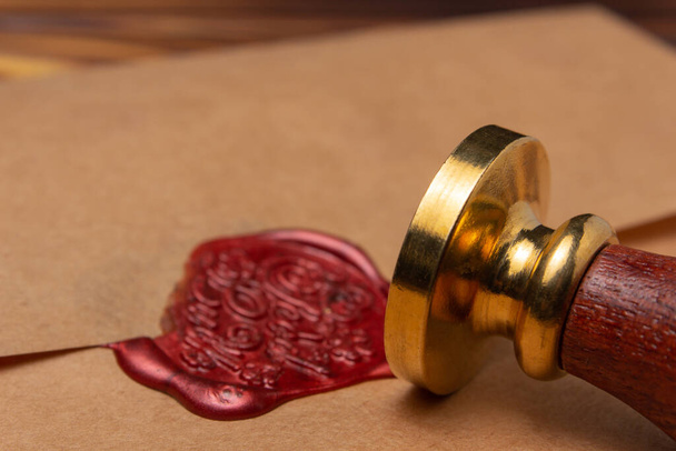 Wax seal with metal stamp on envelope - Photo, Image
