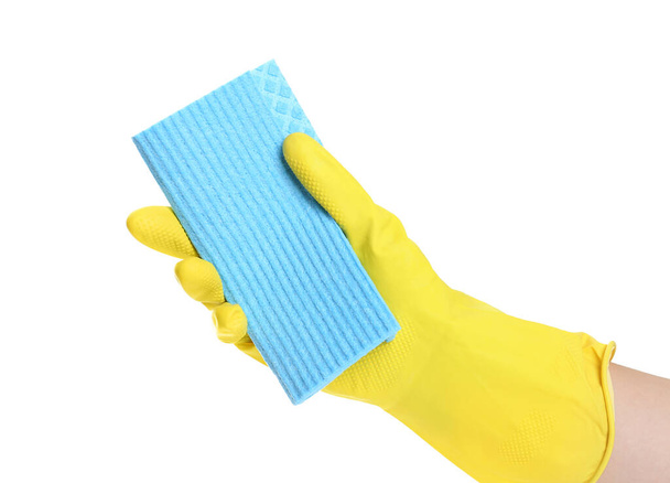 Person in rubber glove with rag on white background, closeup of hand - Photo, Image