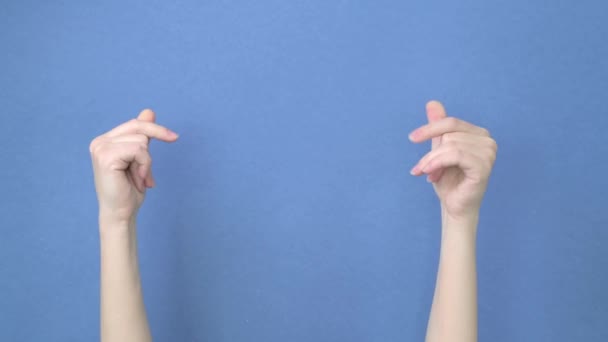 Two female beautiful caucasian hand snaps fingers. Isolated on background. - Video, Çekim