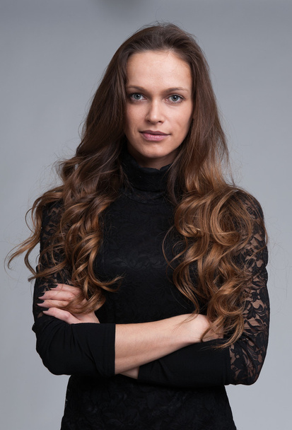 Beautiful young woman with long dark hair - Fotoğraf, Görsel