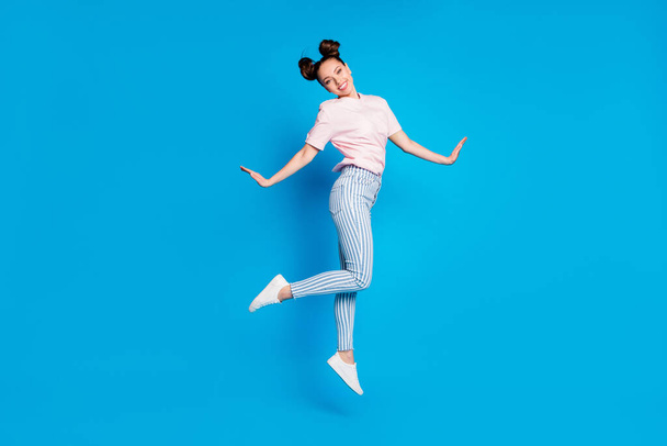 Full length body size view of nice attractive lovely cute pretty sweet funny feminine slim fit thin cheerful cheery girl jumping posing going isolated bright vivid shine vibrant blue color background - Фото, изображение