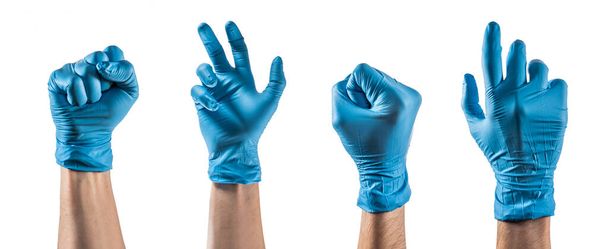 Quelques mains avec un gant en latex bleu faisant des gestes différents - Photo, image