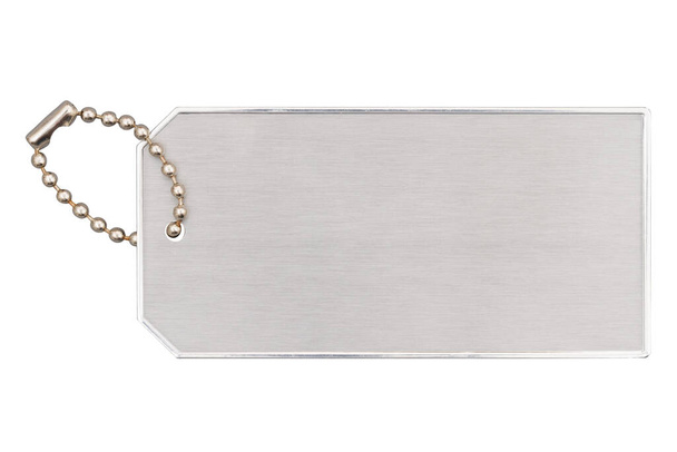 Blanco zilveren metalen ID tag geïsoleerd op wit met kopieerruimte - Foto, afbeelding