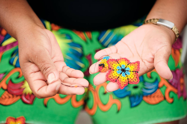 Indigenous Woman Beading Flower Coaster At Market Stall For Tourists - Photo, Image