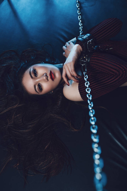 Young asian woman with chains sexy bdsm style portrait - Fotoğraf, Görsel