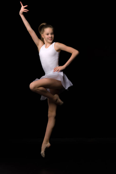 Full length portrait of a charming gymnast girl in elegant dress. - Valokuva, kuva