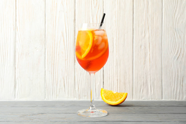Aperol spritz cocktail on wooden background. Summer drink - Φωτογραφία, εικόνα
