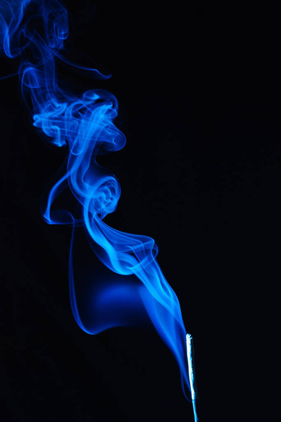 blue smoke incense stick on black background - Φωτογραφία, εικόνα