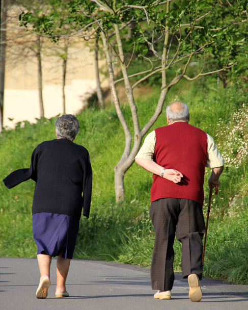 Ageing people waking in the street - Zdjęcie, obraz