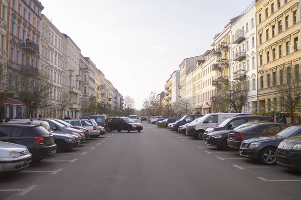BERLIN, GERMANY - Mar 30, 2017: A street in Berlin district Prenzlauer Berg which shows the bad parking situation in the city. The car just found the last parking space. - Фото, изображение