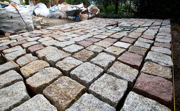 backyard made of granite cubes during construction - Photo, Image