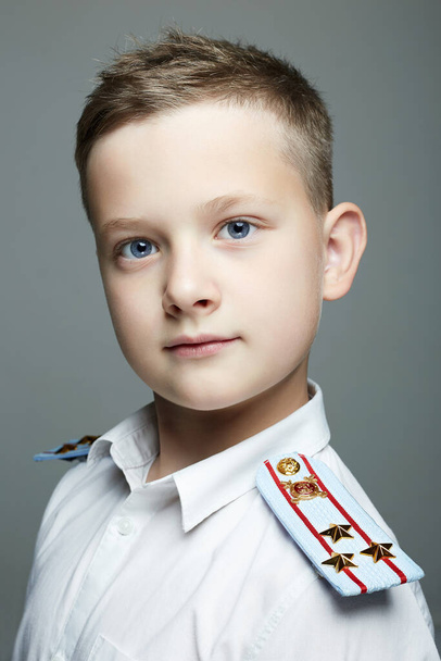 young officer. handsome boy weared in uniform. Police child - Photo, Image