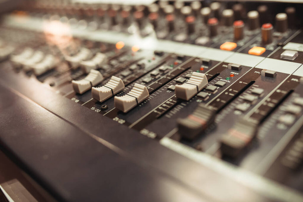 Equalizer adjusting Sound recording studio mixing desk - Foto, Imagen