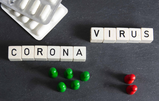 μια φωτογραφία συμβόλων για τον ιό Coronavirus - Φωτογραφία, εικόνα