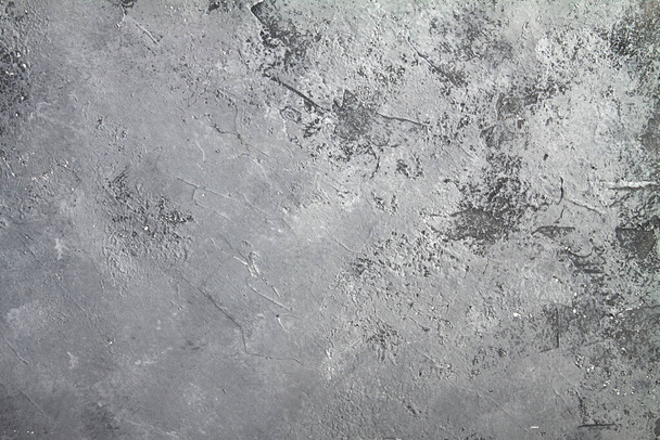 piedra retro Concreto fondo gris oscuro con viejas rayas absolutas y salpicaduras negras. Pintura gruesa Textura de suelo o pared de cemento en el estilo grunge. Espacio para texto
 - Foto, imagen