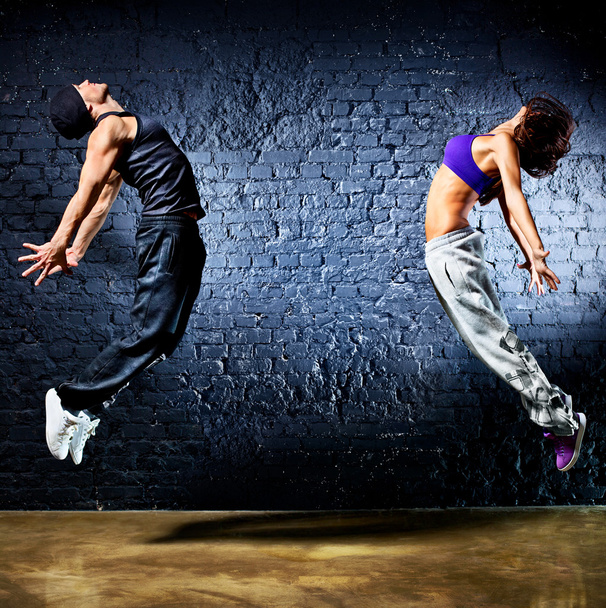Young dancer couple jumping - Zdjęcie, obraz