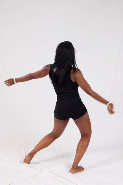 Pretty Black woman dancing - Photo, Image