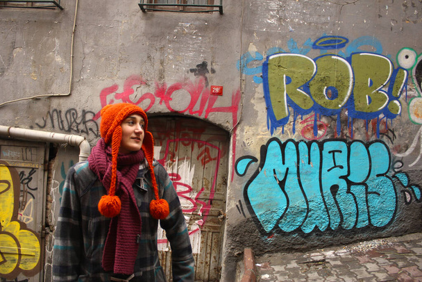 Young girl portrait on the urban street art background, Istanbul, turkey - Photo, Image