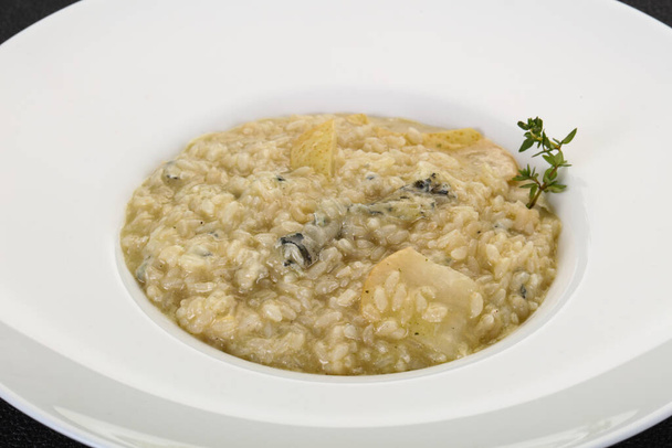 Risotto z gruszką i serem gorgonzola - Zdjęcie, obraz